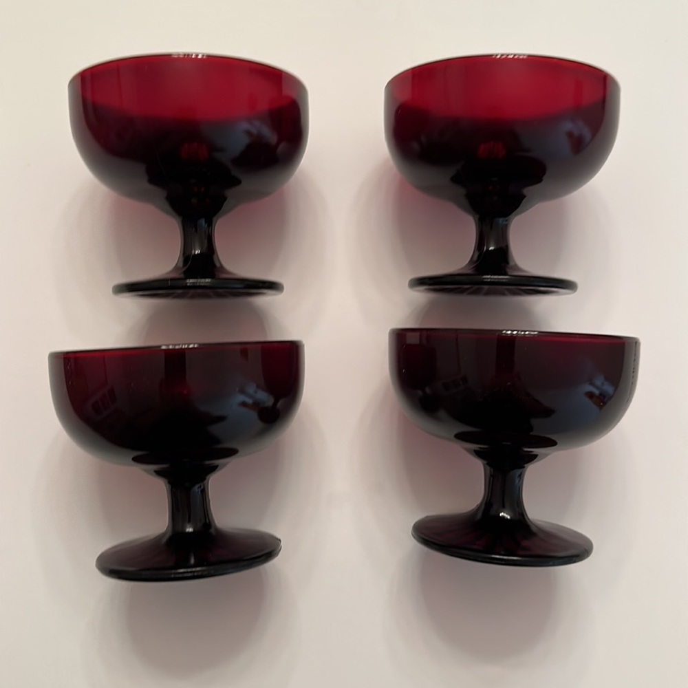 Set of 4 Ruby Red Glass Sherbet Dishes. Measures 3” Tall & Holds 3/4 Cup Liquid.